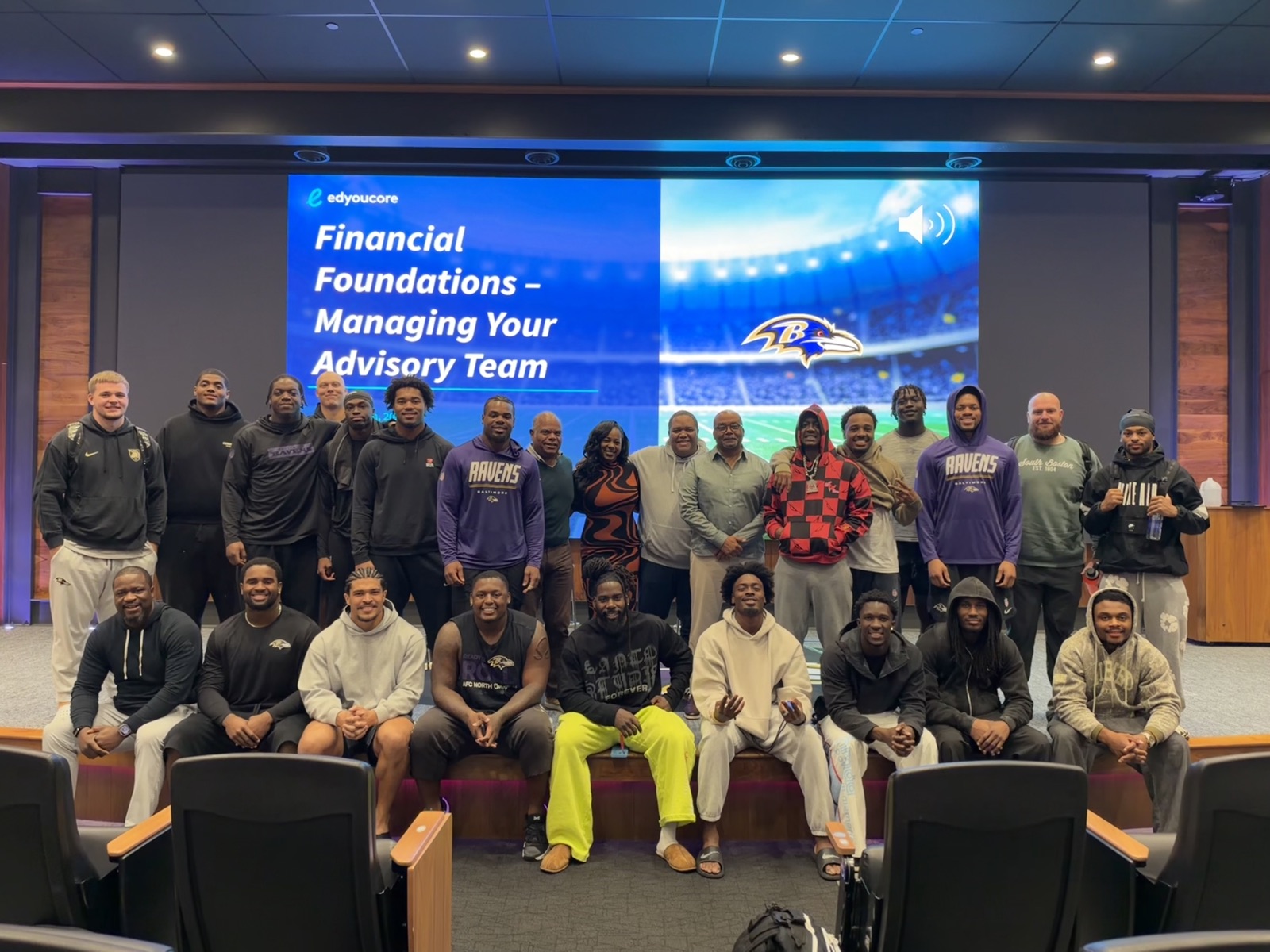 Baltimore Ravens players and Edyoucore team members at a Financial Foundations session.